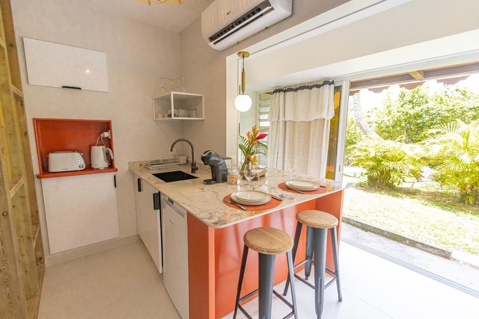Studio Le Cosy Jungle & Piscine Apartment in Le Gosier