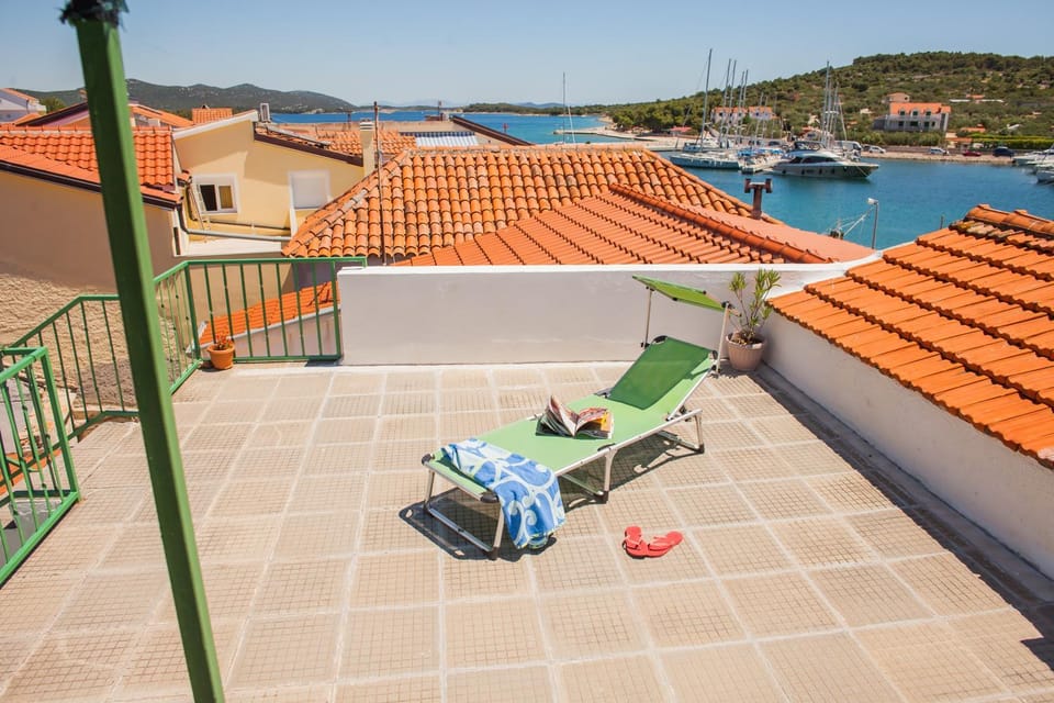 Apartments Lapov - first row to the sea Apartment in Tisno