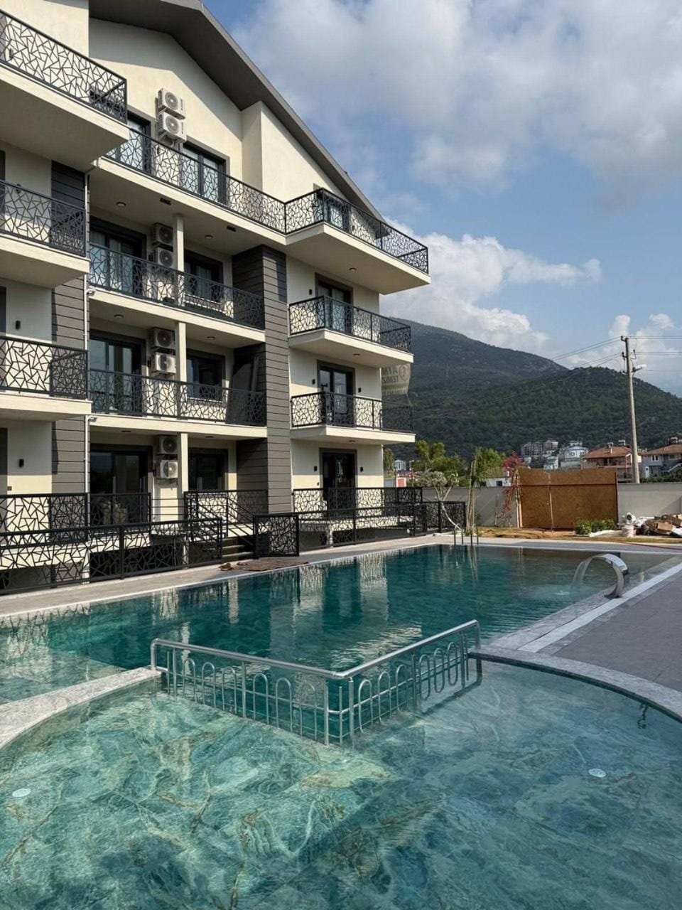 Property building, Day, Natural landscape, Mountain view, Pool view, Swimming pool, sunbed