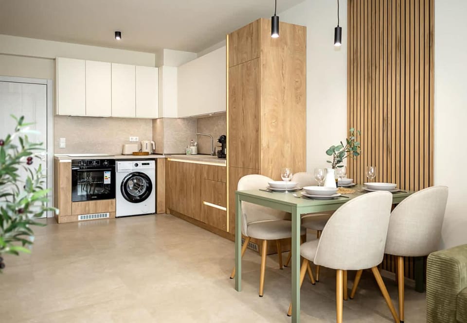 Kitchen or kitchenette, Dining area, dishwasher, oven, stove, washing machine