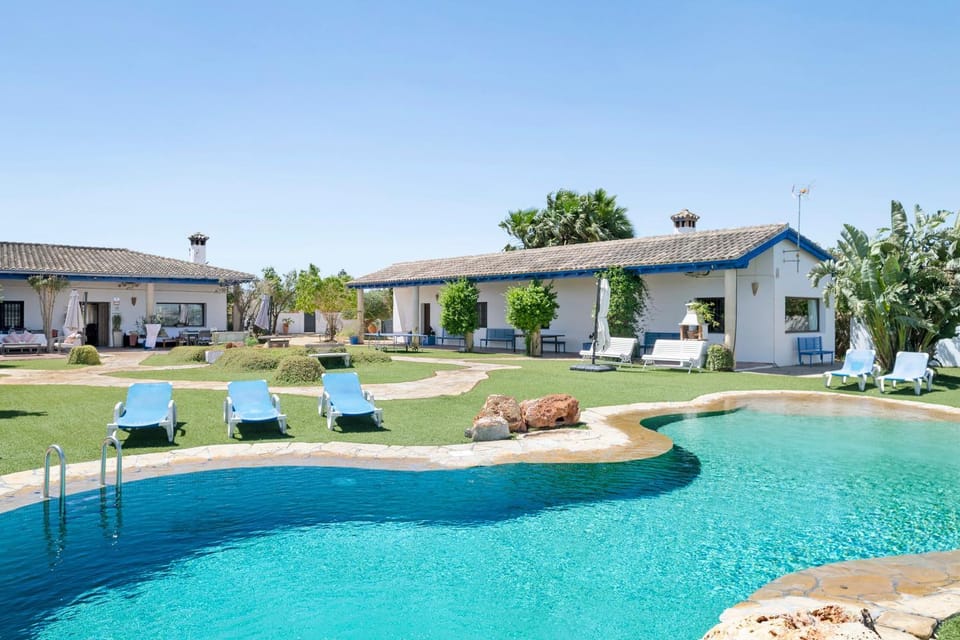 Property building, Living room, Swimming pool