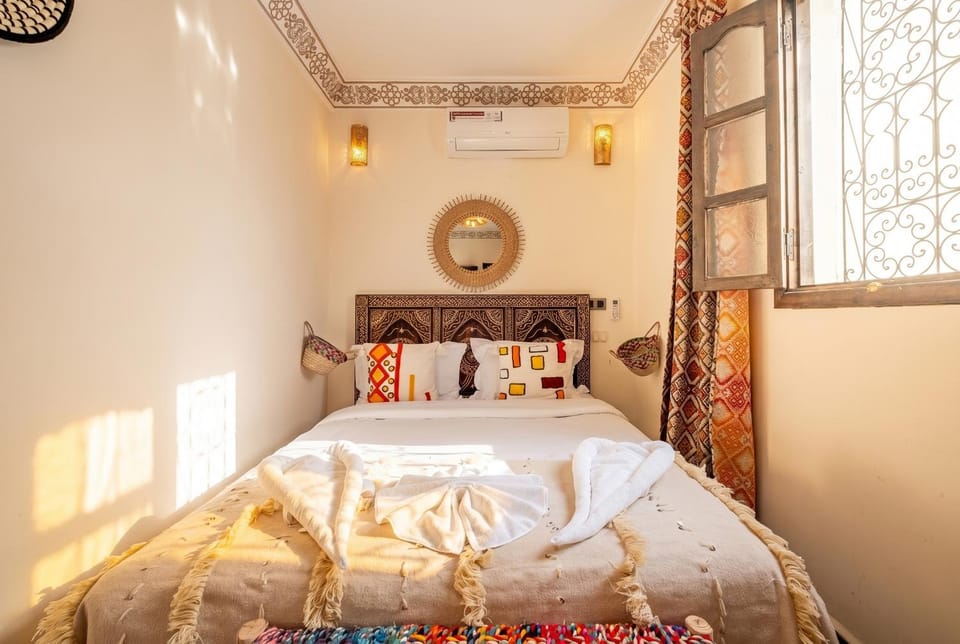 Bed, Photo of the whole room, Bedroom, towels, air conditioner