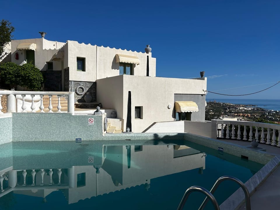 Property building, Day, View (from property/room), Swimming pool