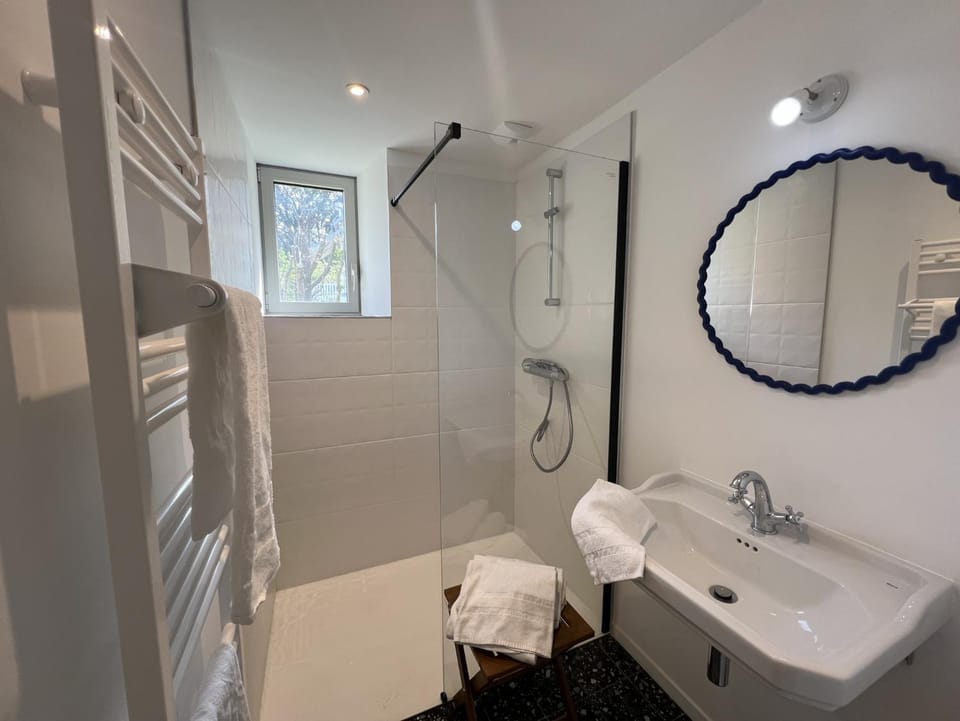Shower, Bathroom, hair dryier, towels