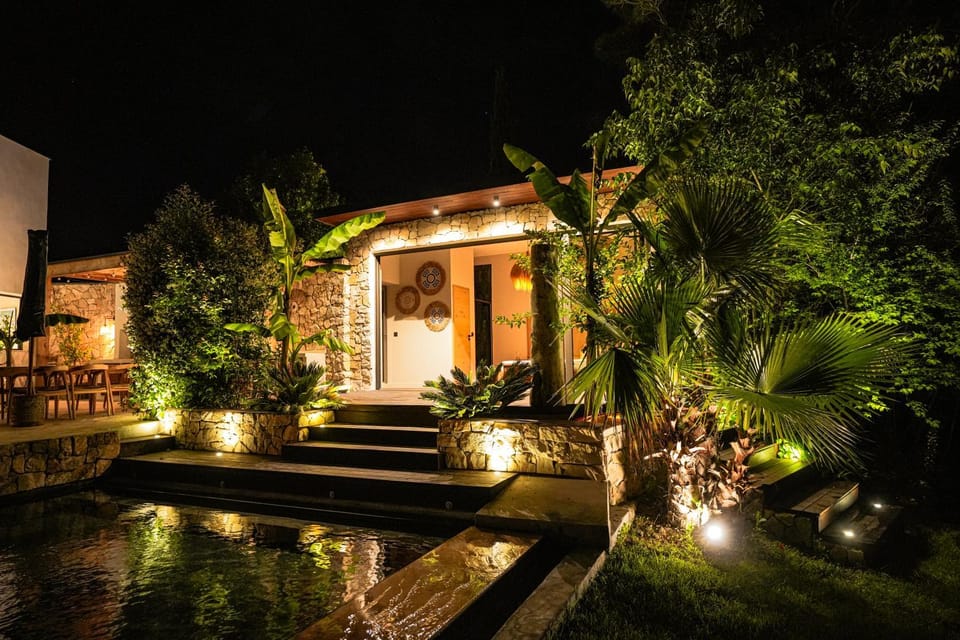 Property building, Patio, Night, Garden, Garden view, Pool view, Swimming pool
