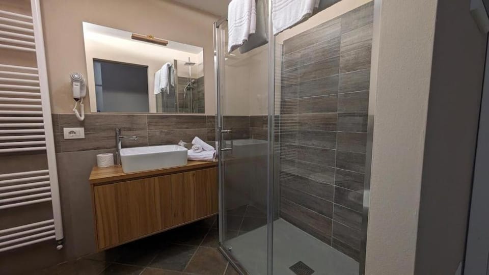 Shower, Bathroom, hair dryier, towels