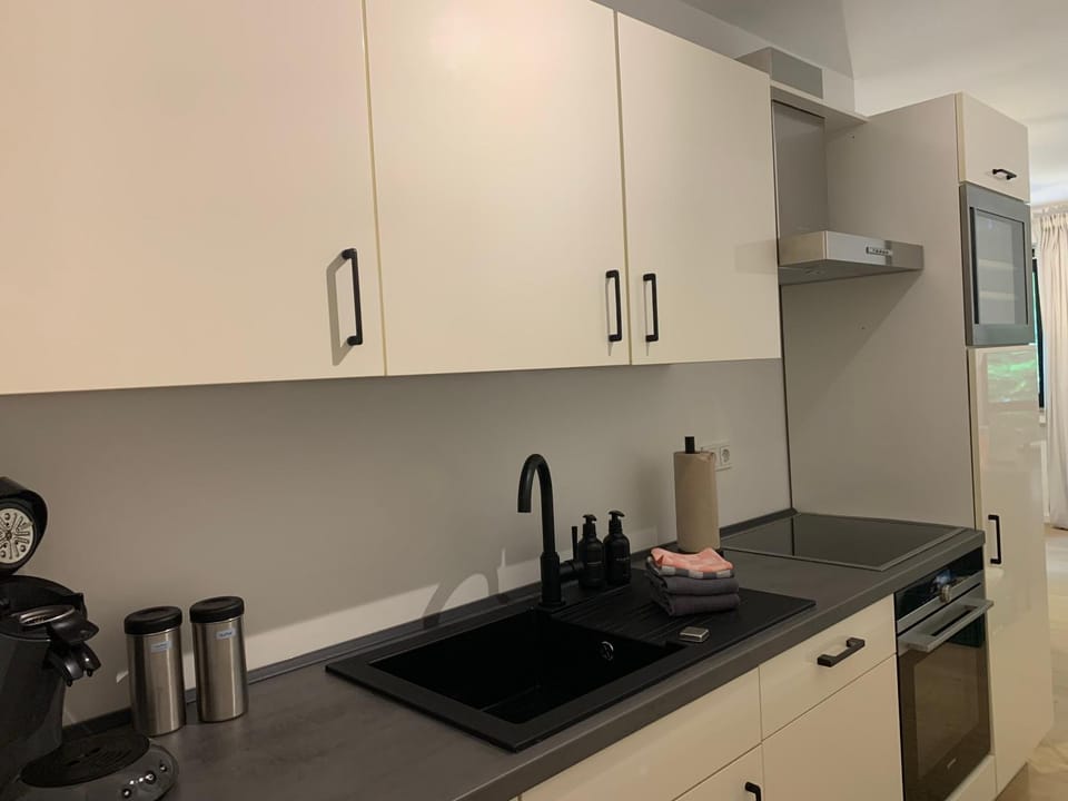 Kitchen or kitchenette, stove