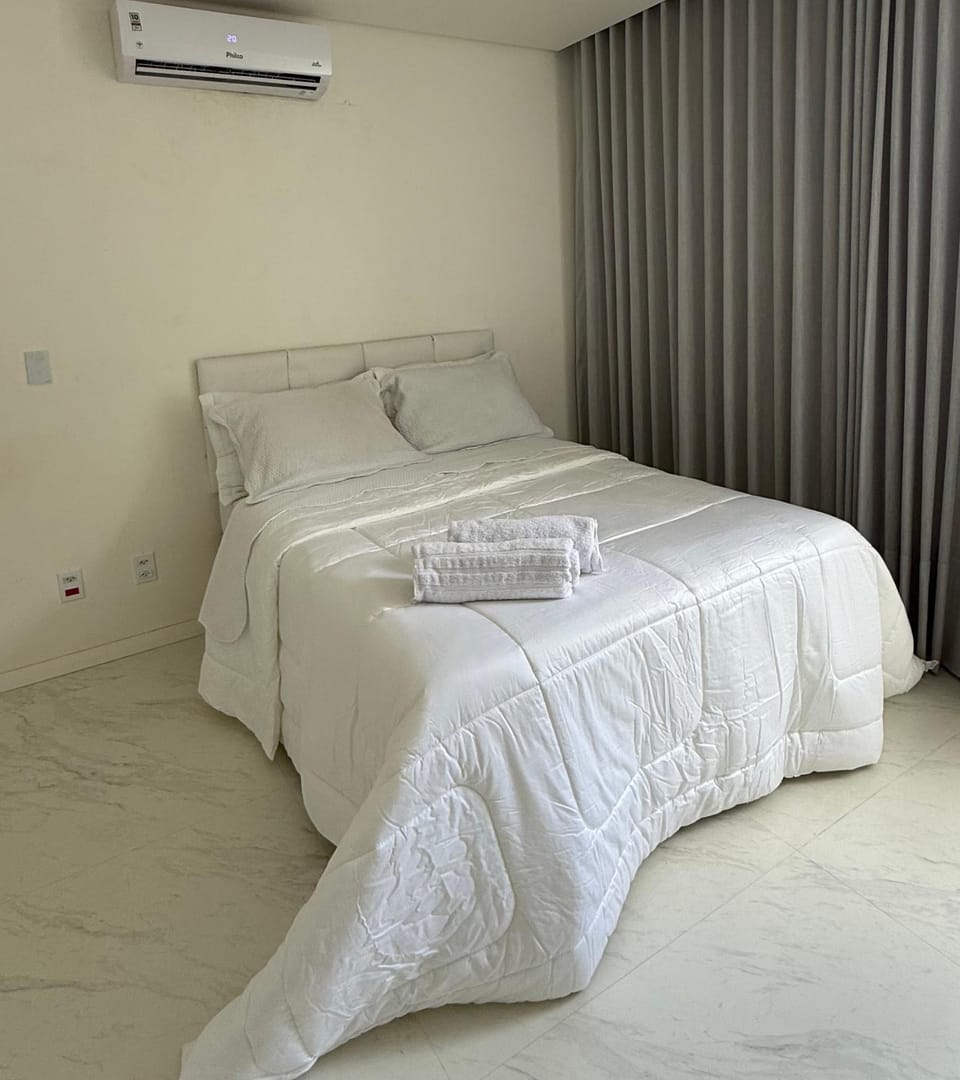 Bed, wardrobe, air conditioner
