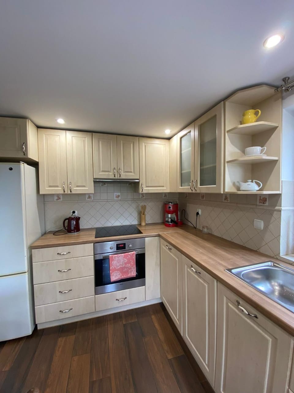 Kitchen or kitchenette, dishwasher, oven, stove, toaster