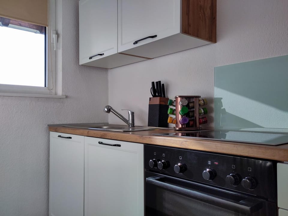 Kitchen or kitchenette, stove