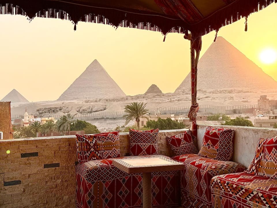 Patio, Nearby landmark, Day, Natural landscape, Living room, Seating area, Mountain view, Sunrise, Sunset