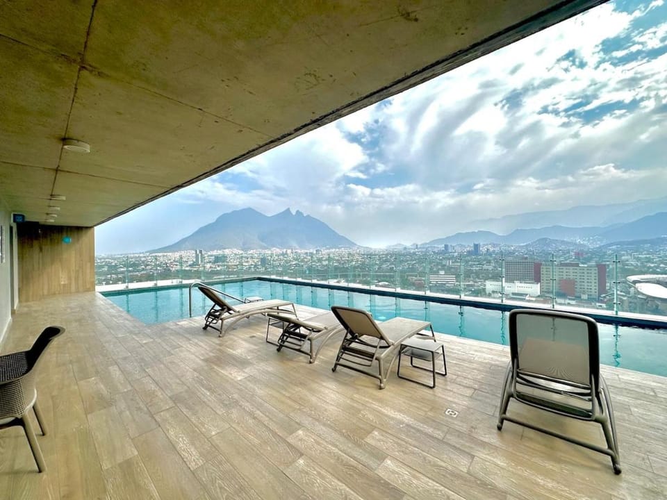 Patio, Day, Natural landscape, View (from property/room), Balcony/Terrace, Living room, Seating area, Mountain view, Pool view, Swimming pool, sunbed