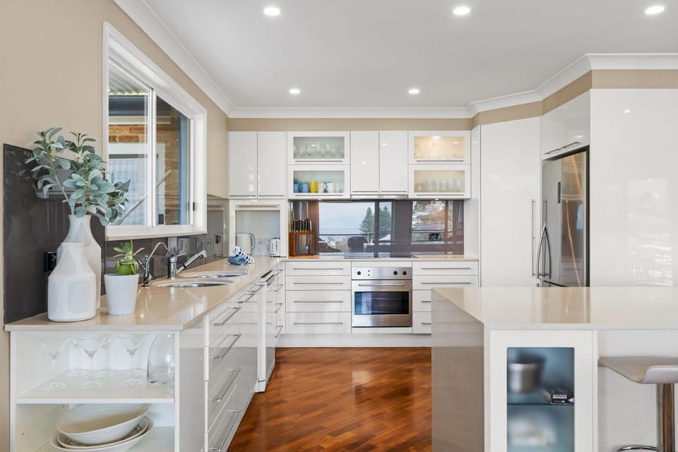 Kitchen or kitchenette, dishwasher, oven, stove, toaster