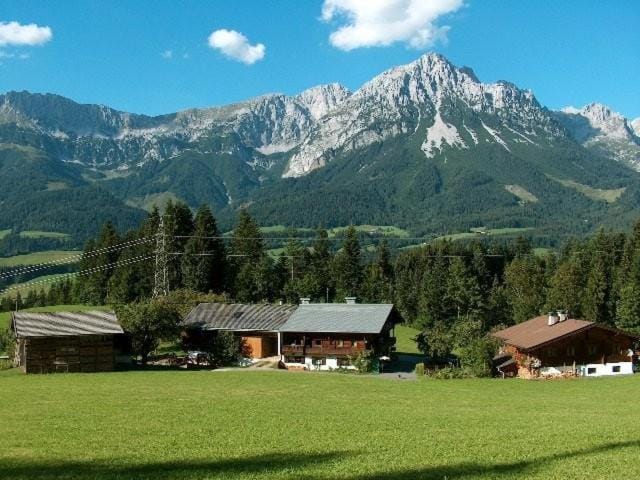 Property building, Nearby landmark, Natural landscape, Mountain view