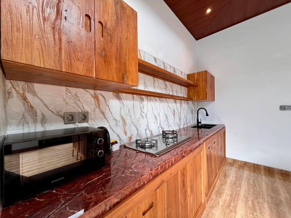Kitchen or kitchenette, microwave, stove, kitchen