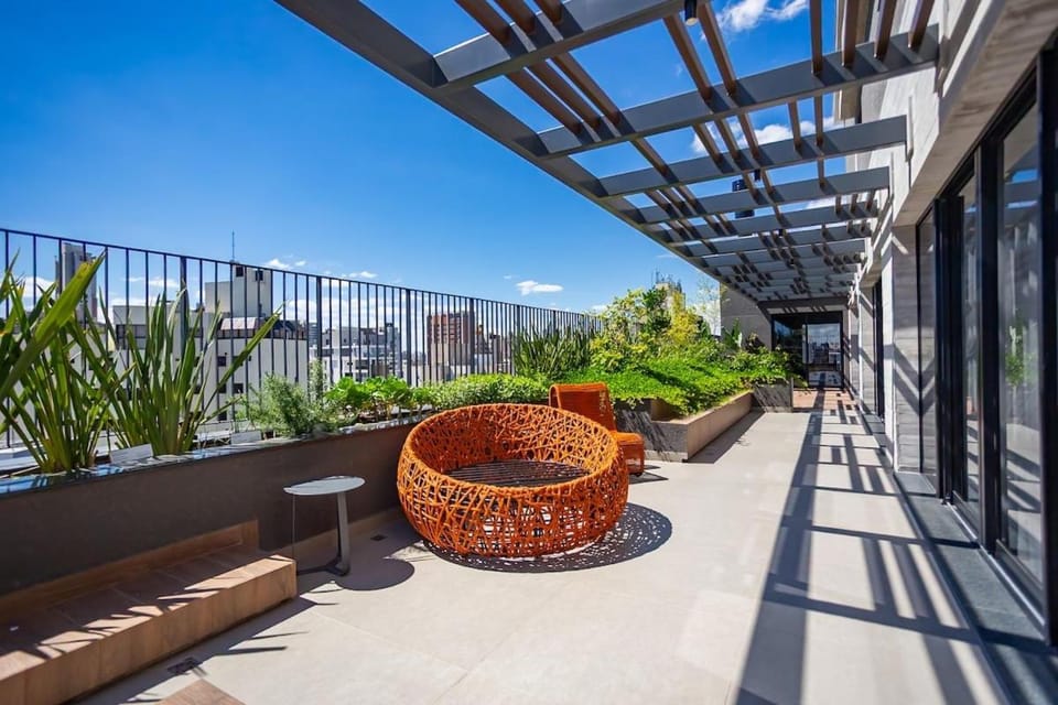 Novo Temple Design Studio • Rooftop Pool Apartment in Curitiba