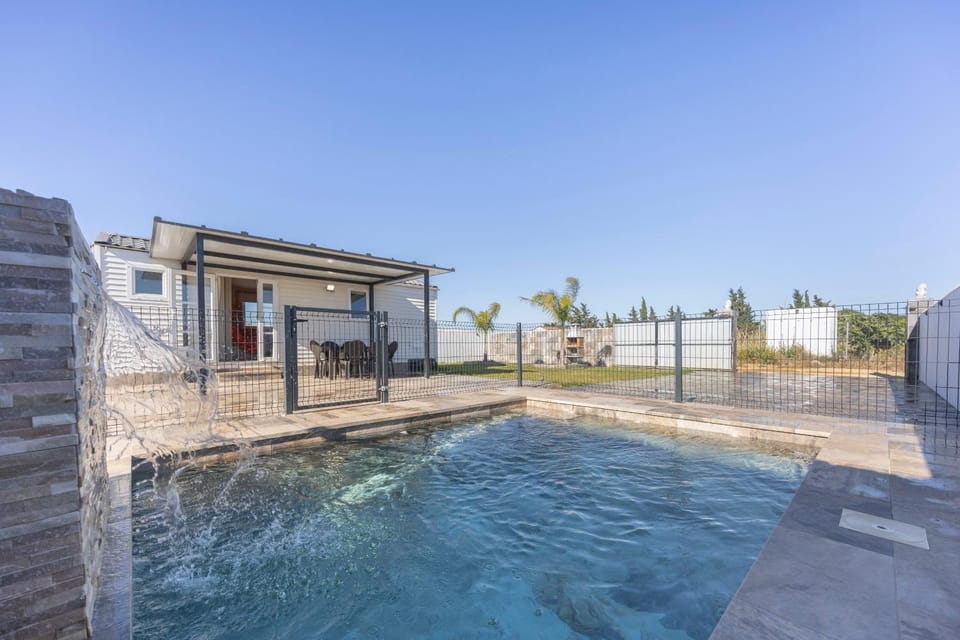 Property building, Living room, Swimming pool