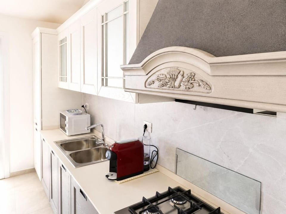Kitchen or kitchenette, dishwasher, microwave, oven, stove, kitchen