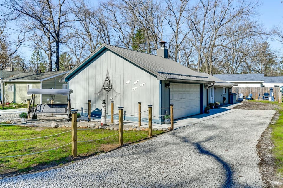Walk to Sand Lake Beach! Family Escape w/ Fire Pit House in Michigan