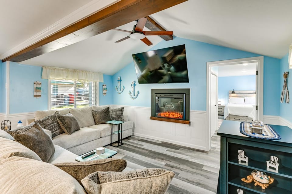 Walk to Sand Lake Beach! Family Escape w/ Fire Pit House in Michigan