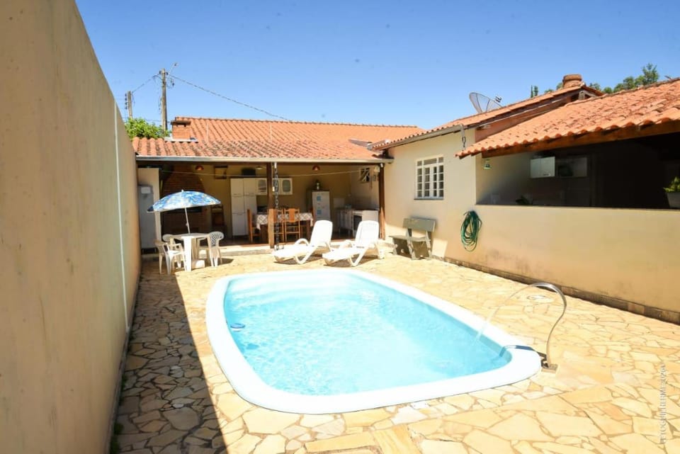 Property building, Patio, Day, Pool view, Swimming pool, sunbed