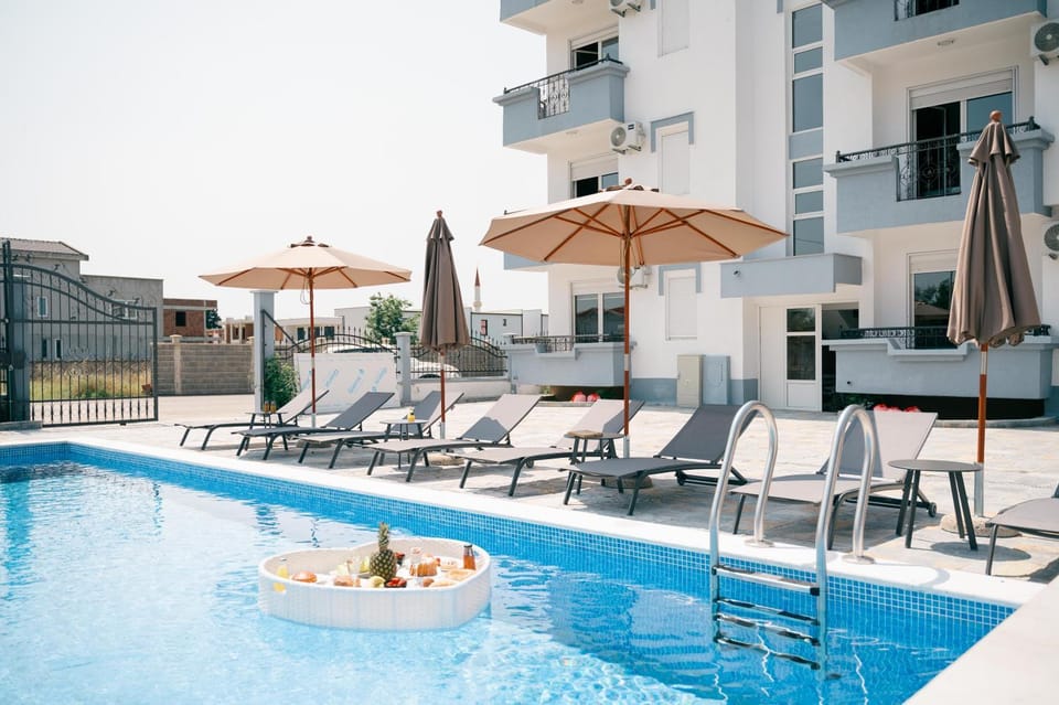 Property building, Patio, Day, View (from property/room), Balcony/Terrace, Pool view, Swimming pool, sunbed