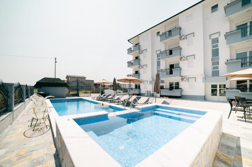 Property building, Patio, Day, View (from property/room), Balcony/Terrace, Pool view, Swimming pool, sunbed