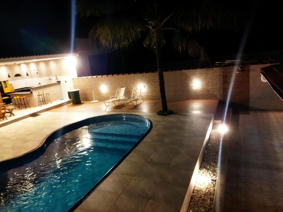 Casa agradável com piscina House in Bertioga