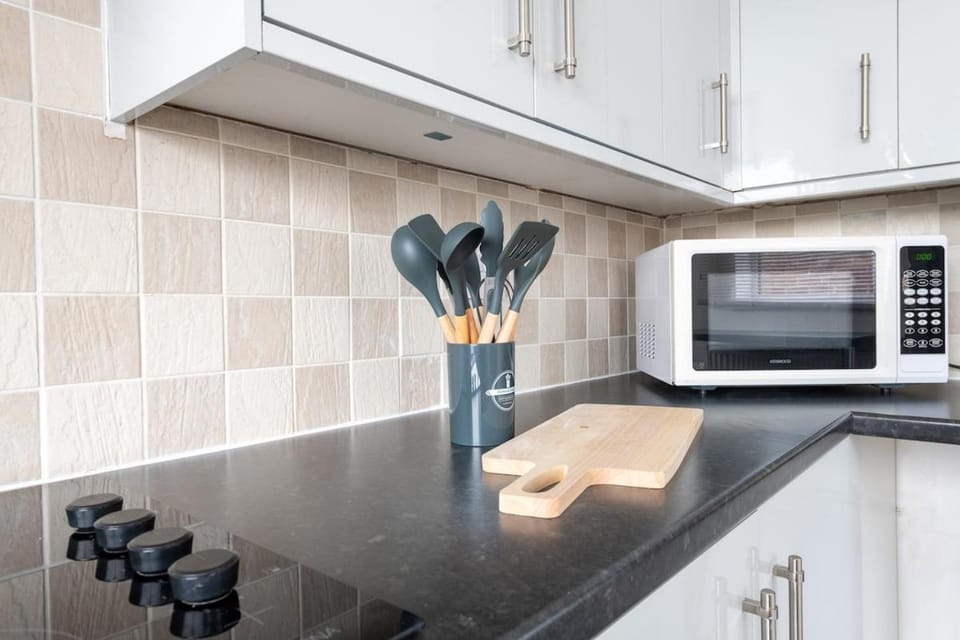 Kitchen or kitchenette, stove, toaster