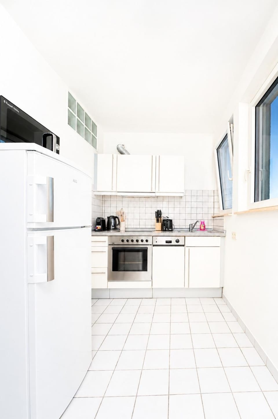 Kitchen or kitchenette, dishwasher, oven, stove, toaster