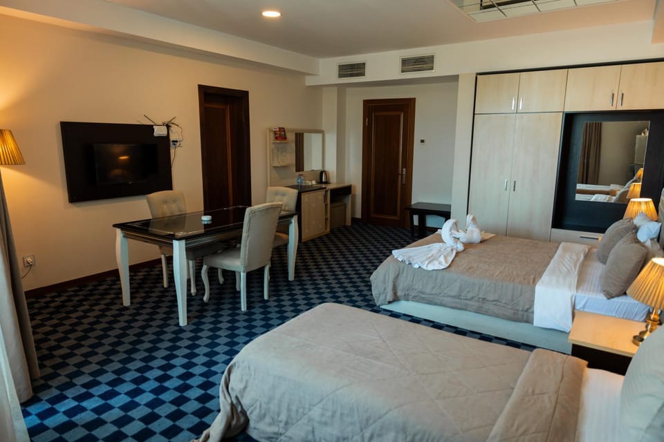 Bed, TV and multimedia, Living room, Photo of the whole room, Seating area, Bedroom, hair dresser, wardrobe, air conditioner