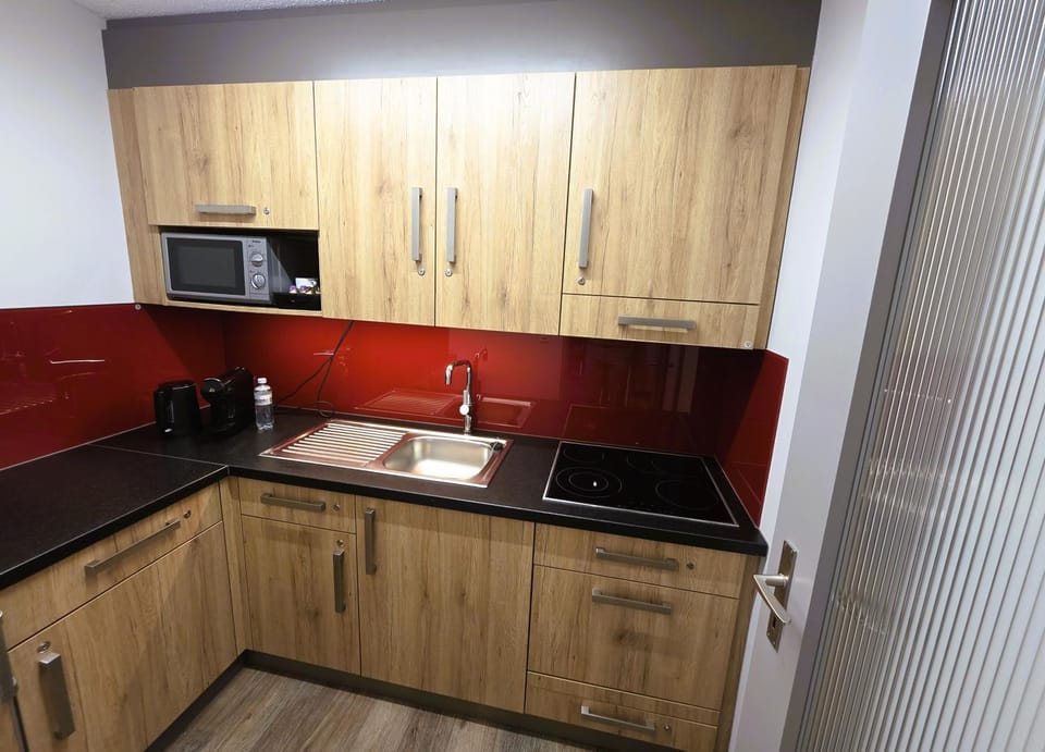 Kitchen or kitchenette, stove