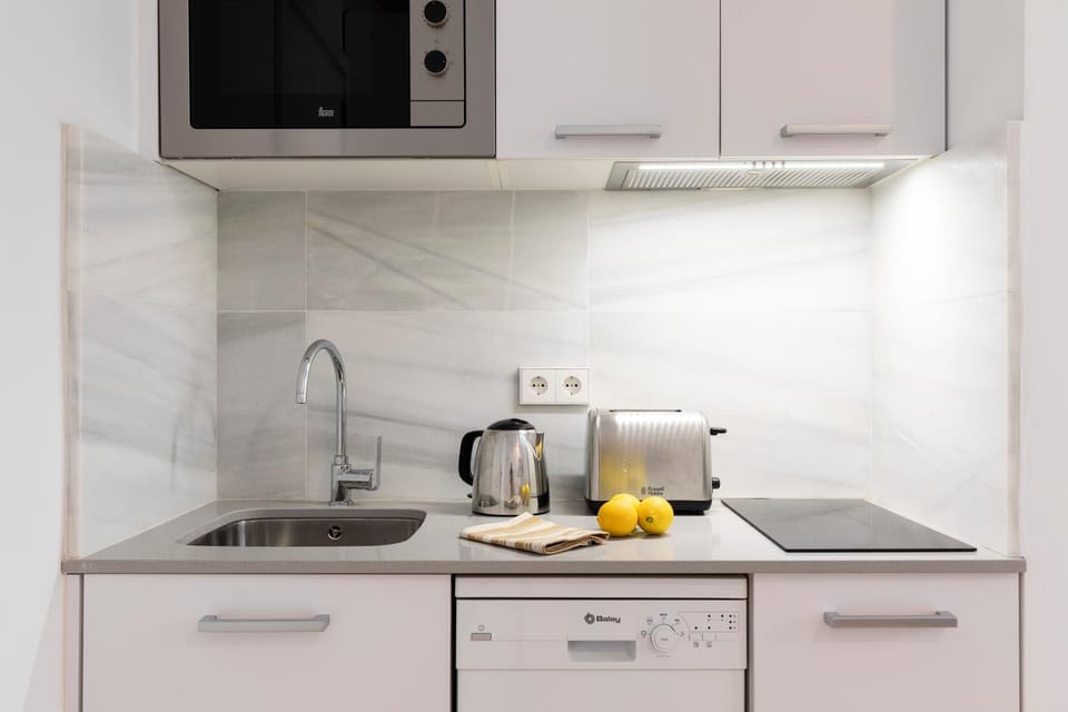 Kitchen or kitchenette, dishwasher, microwave, toaster