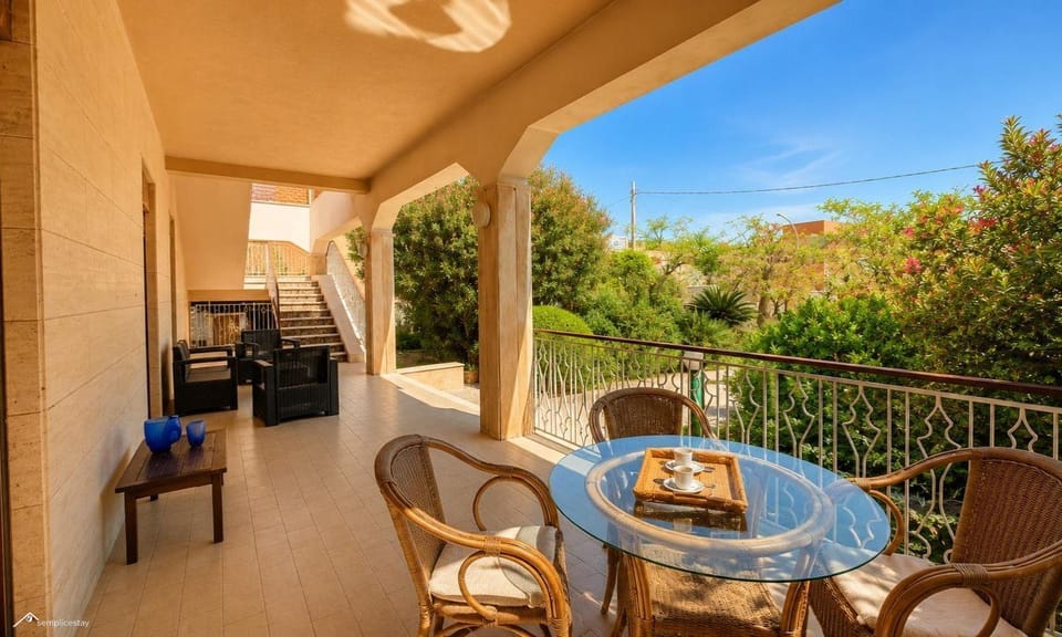 Property building, Patio, Day, View (from property/room), Balcony/Terrace, Seating area, Dining area