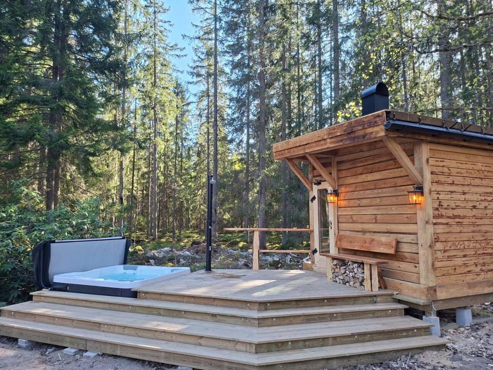 Covert Retreat Timber Cabin with Sauna & Hot-Tub Cabin in Sweden