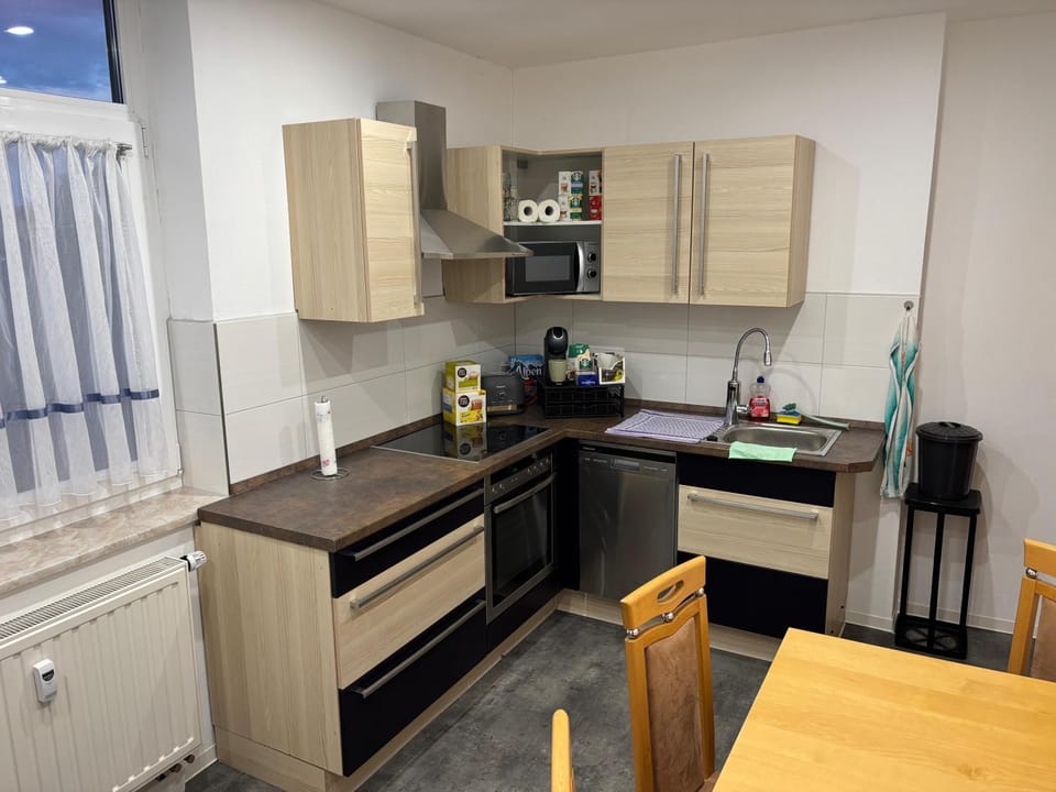 Kitchen or kitchenette, Dining area, dishwasher, stove, toaster