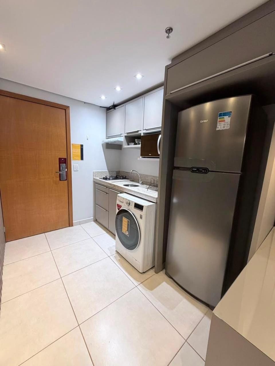 Kitchen or kitchenette, washing machine
