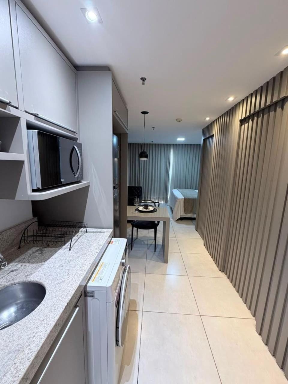 Kitchen or kitchenette, washing machine