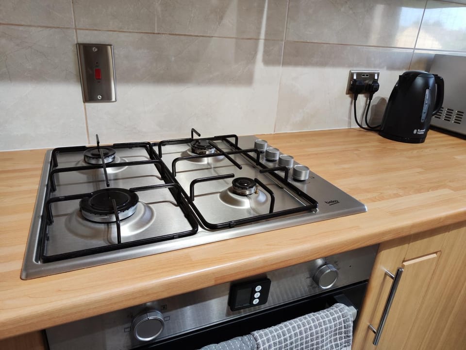Kitchen or kitchenette, stove