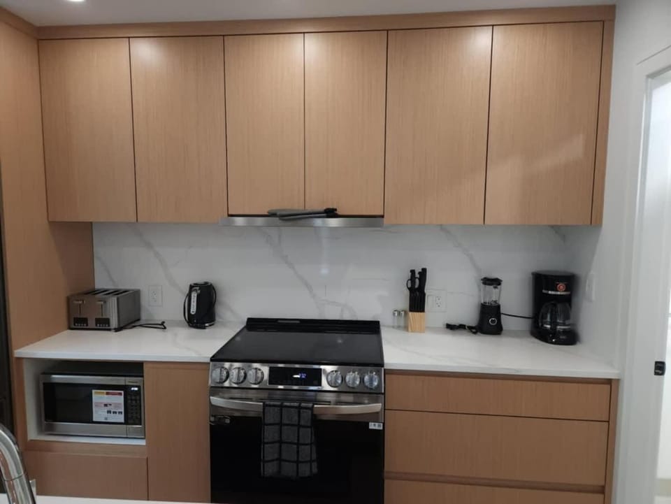 Kitchen or kitchenette, dishwasher, stove, toaster
