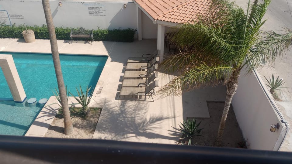 Property building, View (from property/room), Balcony/Terrace, Pool view