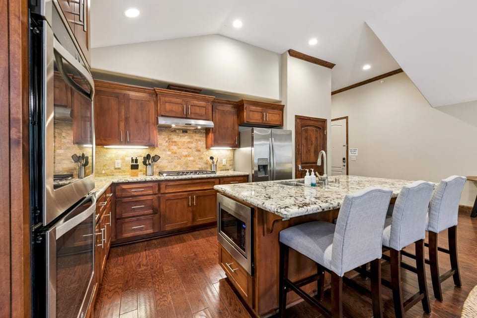 Kitchen or kitchenette, Seating area, furniture, microwave, oven, stove