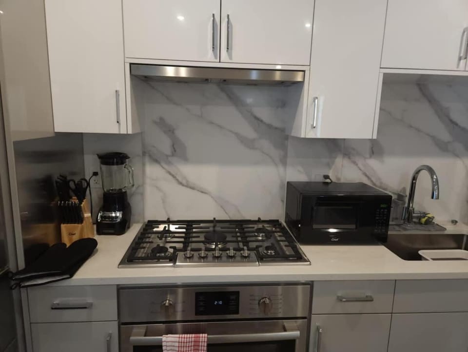 Kitchen or kitchenette, stove, toaster