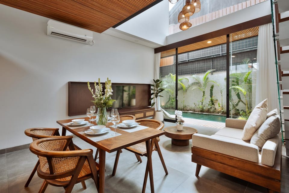 Living room, Seating area, Dining area, Pool view, air conditioner