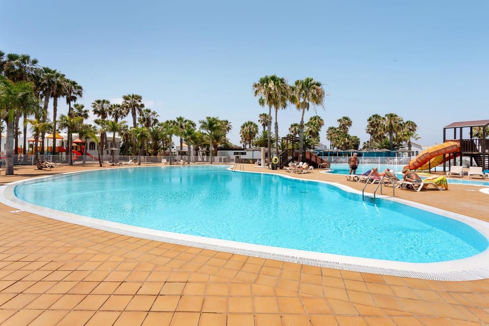 Property building, Living room, Swimming pool