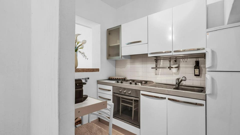 Kitchen or kitchenette, stove
