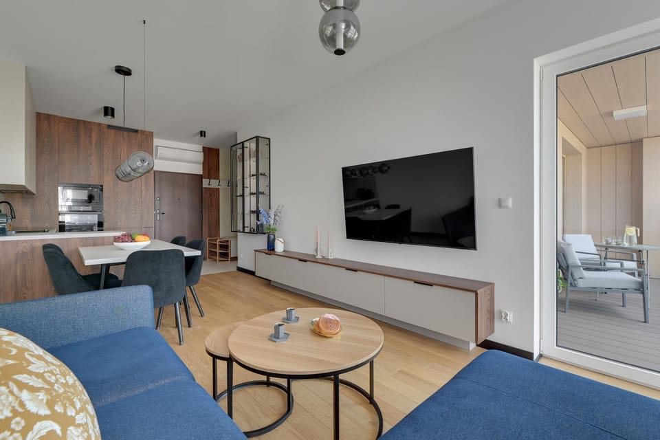 TV and multimedia, Kitchen or kitchenette, Living room, Seating area, Dining area, oven, stove, air conditioner