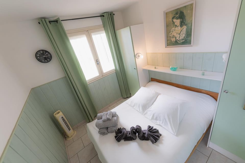 Bed, View (from property/room), storage, storage, towels, towels