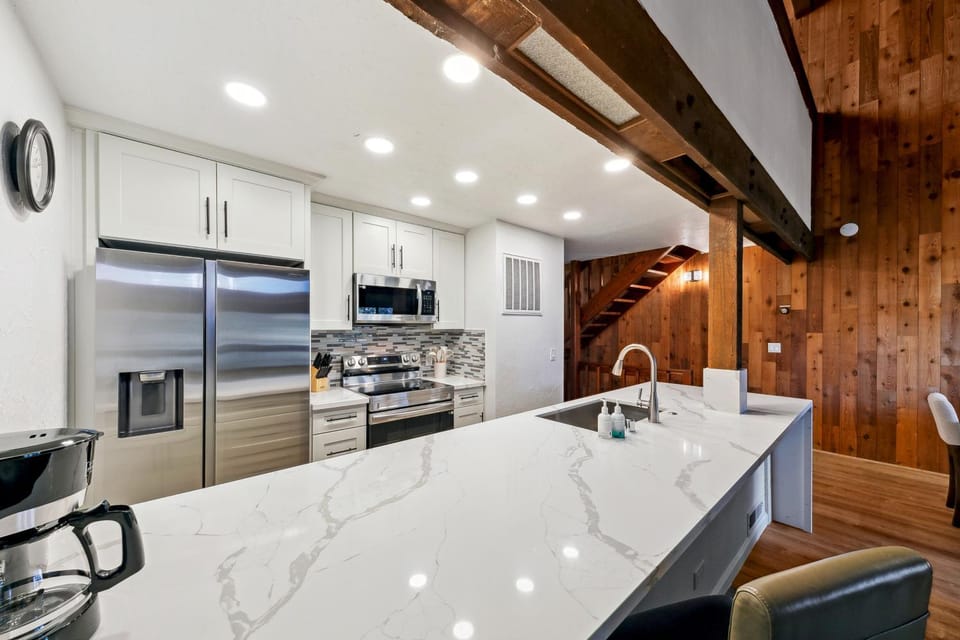 Kitchen or kitchenette, dishwasher, furniture, microwave, oven, kitchen