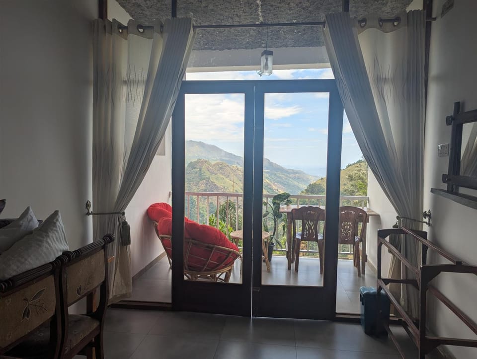 Natural landscape, View (from property/room), Balcony/Terrace, Living room, Seating area, Mountain view
